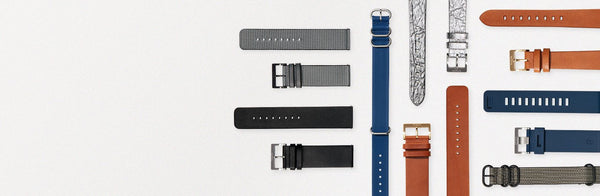 A collection of leather, silicone and sustainable Nixon watch bands.